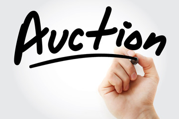 Auction text with marker, business concept background