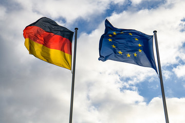 State flag of Federal Republic of Germany and the flag of the European Union.