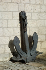 A old rusty anchor in a Kotor, Montenegro