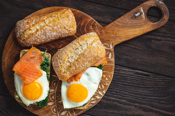 Spinach, smoked salmon and runny egg sandwiches. 