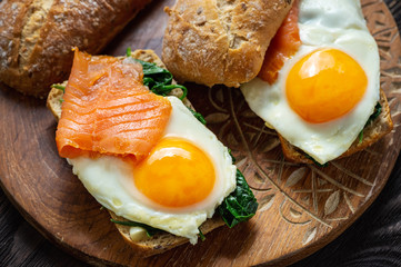 Spinach, smoked salmon and runny egg sandwiches. 