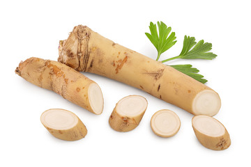 Horseradish root with slices and parsley isolated on white background
