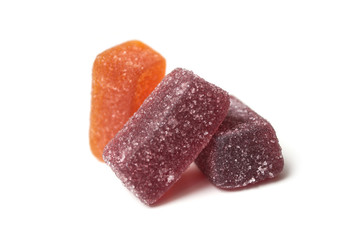 Closeup of fruit pastes on white background