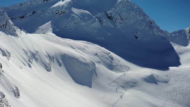 4k aerial footage with ski mountaineers competing during a ski touring and mountaineering race in Fagaras mountains