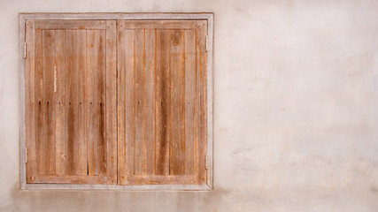 Window frame on the cement wall