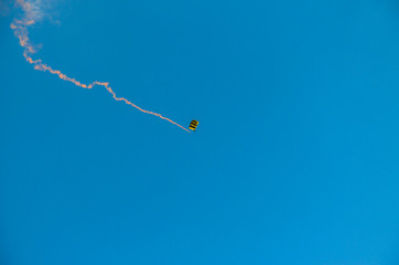 skydiver with smoke