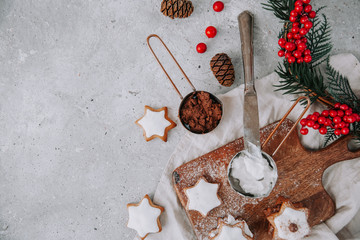 Homemade Christmas star shape gingerbread cookies with cheese cream. Top view