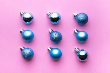Christmas background. Xmas balls isolated on pink. Bubble pattern decoration. Flat lay. Winter concept