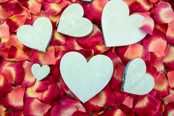 Obraz premium hearts on a background of rose petals