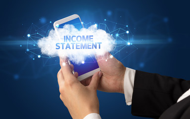 Female hand touching smartphone with INCOME STATEMENT inscription, cloud business concept