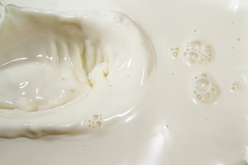 Fototapeta na wymiar Close up of milk splash