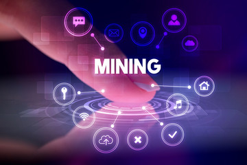 Finger touching tablet with web technology icons and MINING inscription, web technology concept