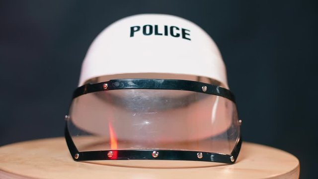 A closeup of a policeman helmet.