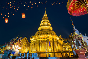 Loy Krathong Festival on twilight time and Floating lantern at Wat Phra That Hariphunchai Temple in Lamphun, Thailand