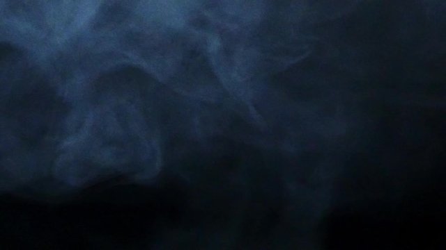 Slow motion Smoke on black background. White smoke slowly, stormy clouds, Mist effect. Fog effect, flying through the air.
