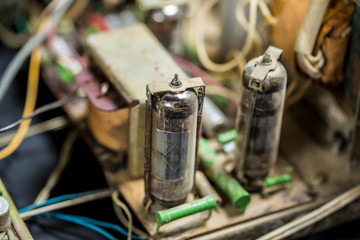 old tube chips with vintage transistors and resistors. small focusing area, selective focus. top view