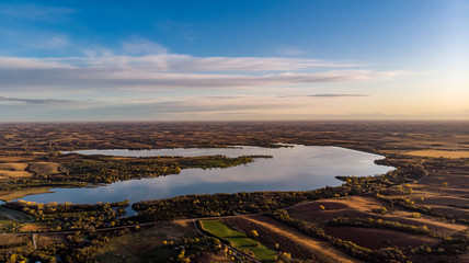 Autumn sunrise over Branched Oak Recreation Area and surrounding trees and rural countryside in Nebraska