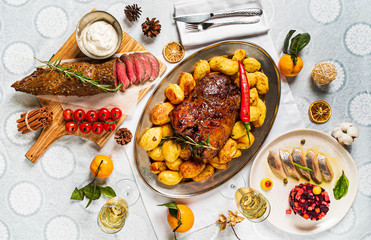 New Year table with different dishes and drinks