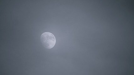 Cloudy sky covering the moon