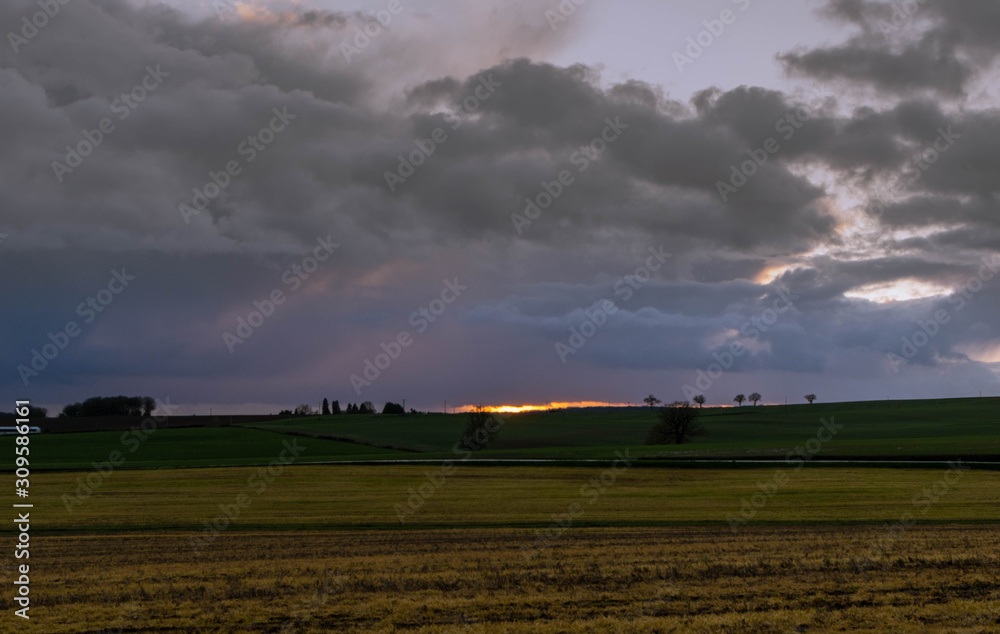 Canvas Prints river illuminated by the sun with clouds