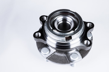 New Wheel hub assembly with bearing. This is part of the car suspension on a gray background with a...