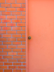 Light red door with red wall