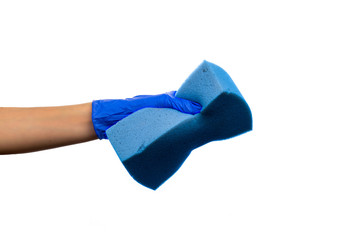 Hand in a blue glove with blue sponge. Cleaning Products and Supplies. Isolated white background