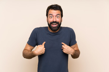 Man with beard with surprise facial expression