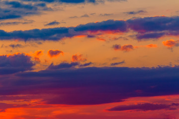 Naklejka na ściany i meble orange sunset sky with clouds. beautiful nature background