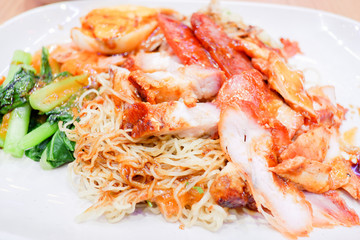 Wantan noodles, a Cantonese Chinese cuisine served dry with soy sauce and roast pork