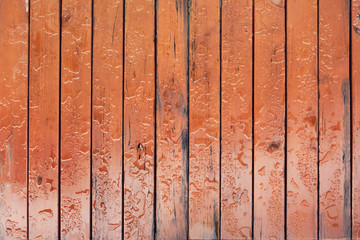 Rain drops on brown wooden table