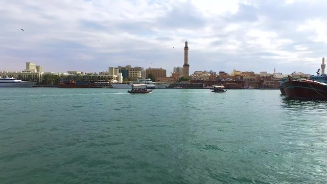 DUBAI, UAE - FEBRUARY 18, 2017: People are sailing on arba boat in Dubai Deira district, old town
