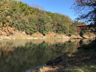 River in Autumn of Mountainous Region	with Reflection