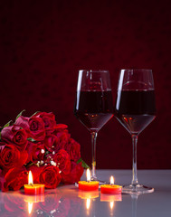 Bouquet of Red Roses and Glasses of Wine