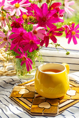 cup of tea and flowers