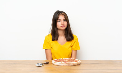 Caucasian girl with a pizza sad