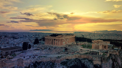Fototapeta premium Aerial drone photo of iconic Acropolis hill and the Parthenon at dusk with beautiful sky and colours, Athens, Attica, Greece