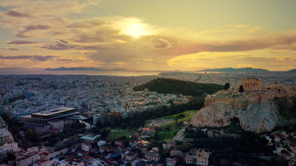 Aerial drone photo of iconic Acropolis hill and the Parthenon at dusk with beautiful sky and colours, Athens, Attica, Greece