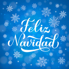 Feliz Navidad calligraphy hand lettering on blue background with bokeh and snowflakes. Merry Christmas typography poster in Spanish. Easy to edit vector template for greeting card, banner, flyer, etc.
