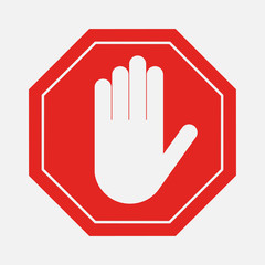 Obraz premium A red octagonal stop sign arm, STOP prohibits