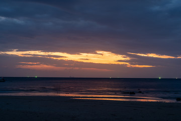 Sunset on a secret beach in Koh Lanta Thailand