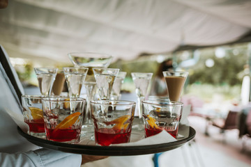 Colorful alcohol drinks in small glasses