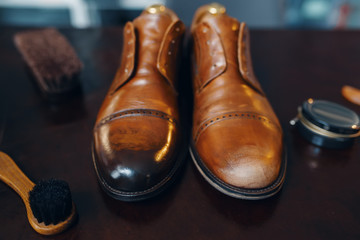 Shoe repair service concept, boots closeup