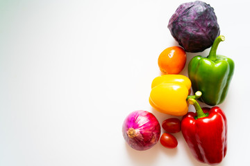 Fototapeta na wymiar Colorful sweet pepper with many beta carotine vegetable on white