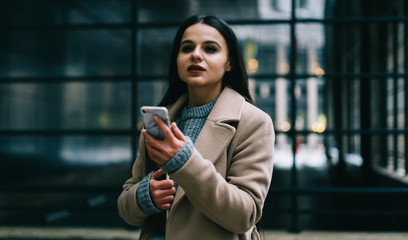 Modern stylish woman with smartphone