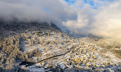 Valtellina (IT) - Sondrio - Panoramic view of Mossini village  with whitewashed landscape