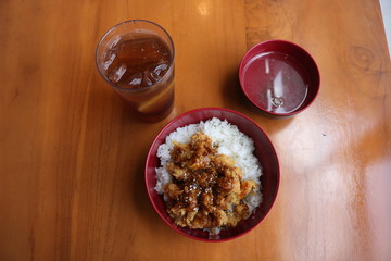 a bowl of delicious rice on the table.