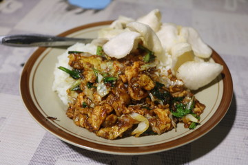 rice with delicious fried eggs on the table..