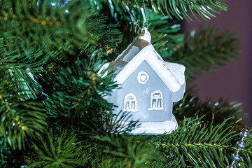 Christmas holiday decorations and toys on home Christmas tree.