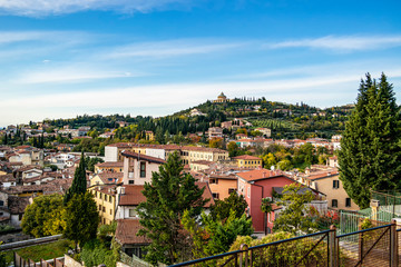 Fototapeta na wymiar Evening view from the top of the city of Verona, Veneto - Italy